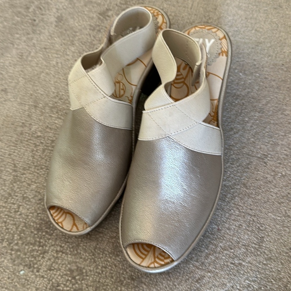 Fly London peep toe sling back.
